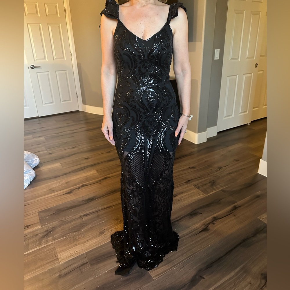 Show stopping black sequin lace gown